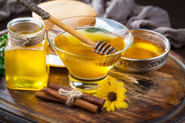 Bee honey in a composition with flowers