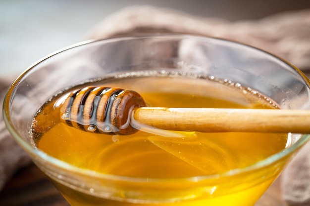 Bee honey in a composition with flowers