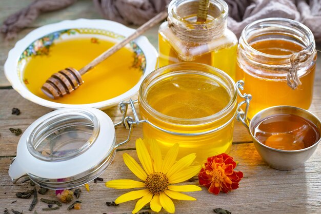 Bee honey in a composition with flowers