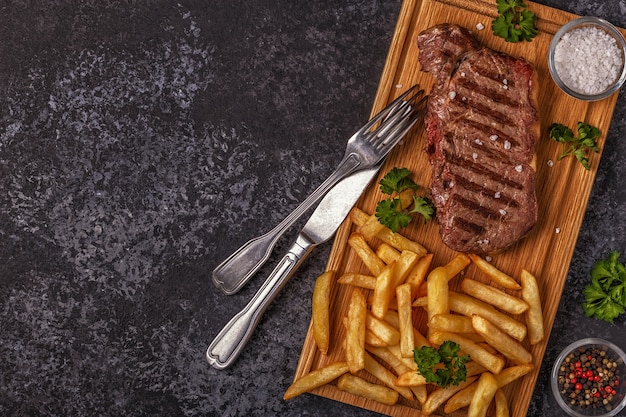 Beef barbecue steak with french fries