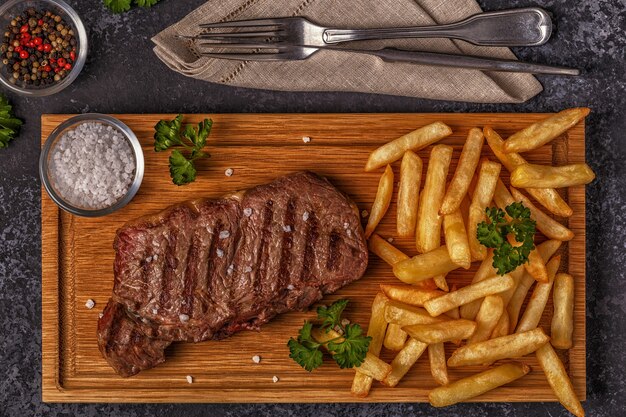 Beef barbecue steak with french fries