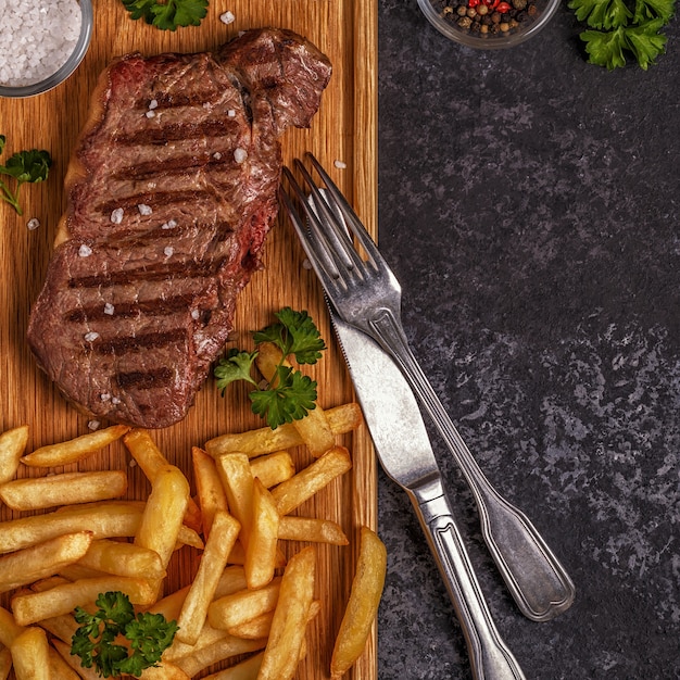 Beef barbecue steak with french fries