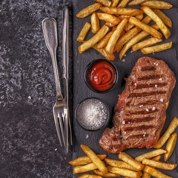 Beef barbecue steak with french fries