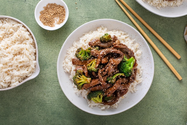 Beef and broccoli stir fry served over rice