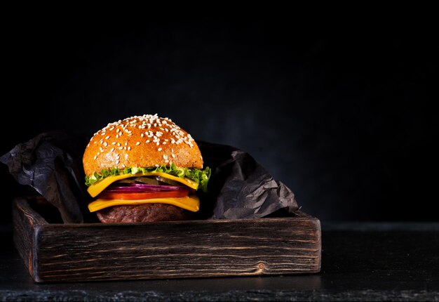 Beef burger or cheeseburger in a wooden box