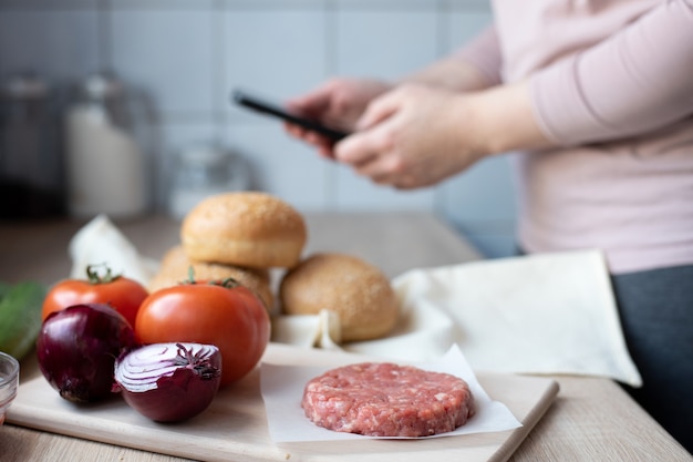 Beef burger at home on the kitchen table