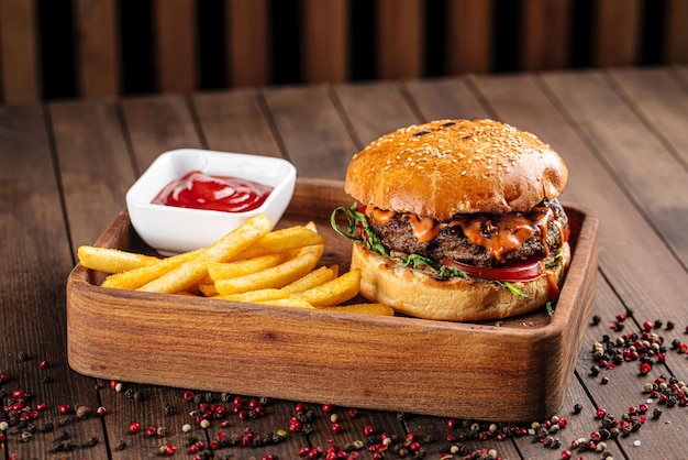 Beef burger lunch set with french fries and ketchup