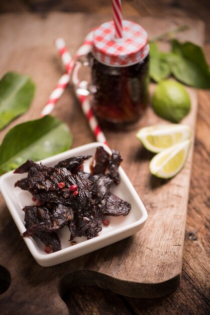 Beef Jerky on wooden background