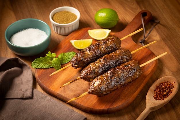 Beef kafta on the wooden board Kafta Traditional Arabic cuisine