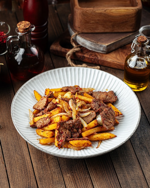 Beef meat roast with potato fries