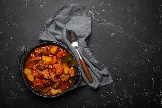 Beef meat stew with potatoes carrot and delicious gravy in