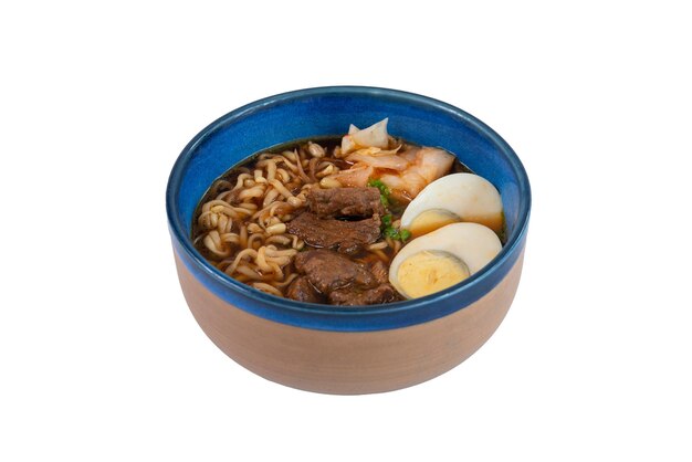 beef ramen in vivid brown blue bowl