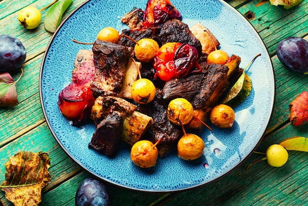 Beef ribs baked in plums