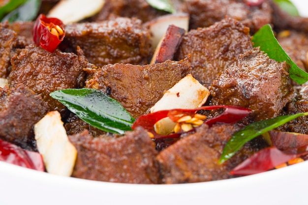 Beef roast masala or curry homemade recipe arranged in white bowl