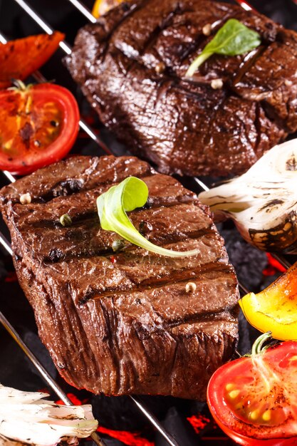 Beef steak on a barbecue grill