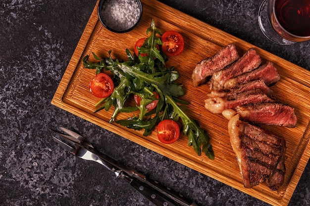 Beef steak on a dark background