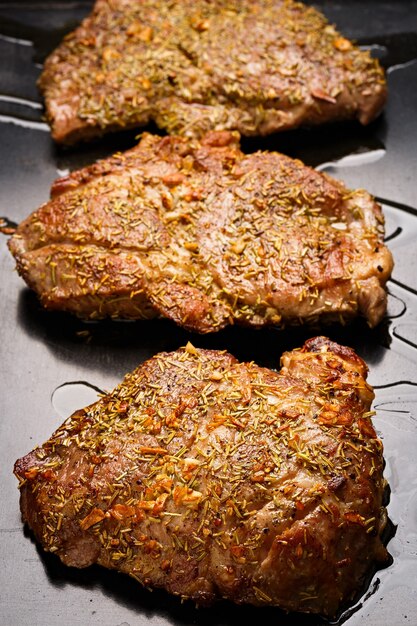 Beef steak fried in the pan.