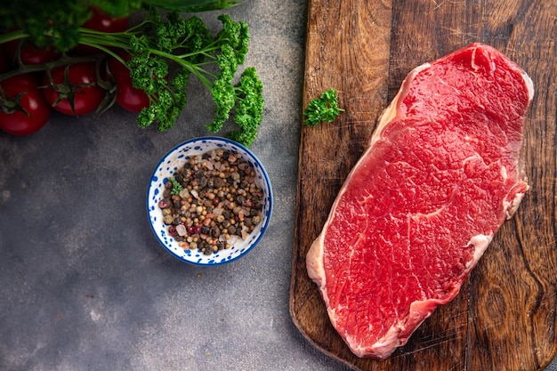 beef steak raw pulp meat raw meat delicious snack mortadella, pistachios, ham healthy meal food