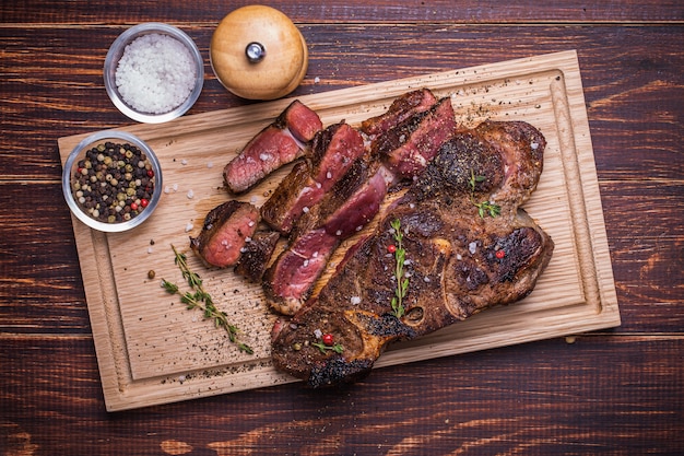 Beef steak on  a wooden background