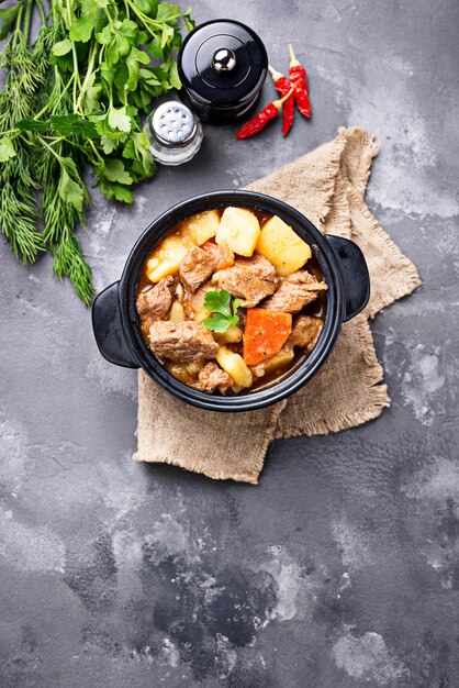 Photo beef stew with potato and carrot