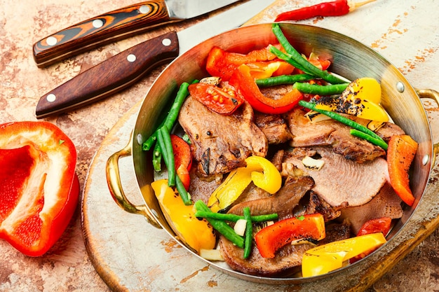 Beef tongue with vegetables