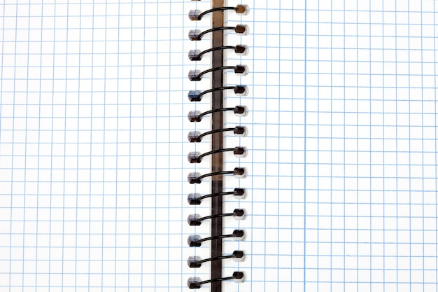Beeld van een notitieboekje in spatie met bladerennet