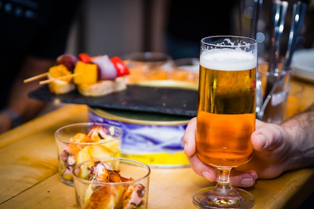 Beer in a bar with pintxos