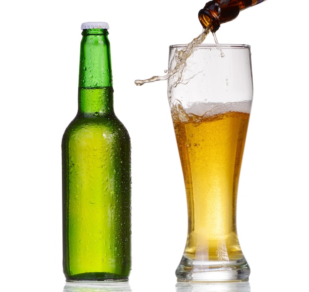 Beer bottle with drops isolated on white