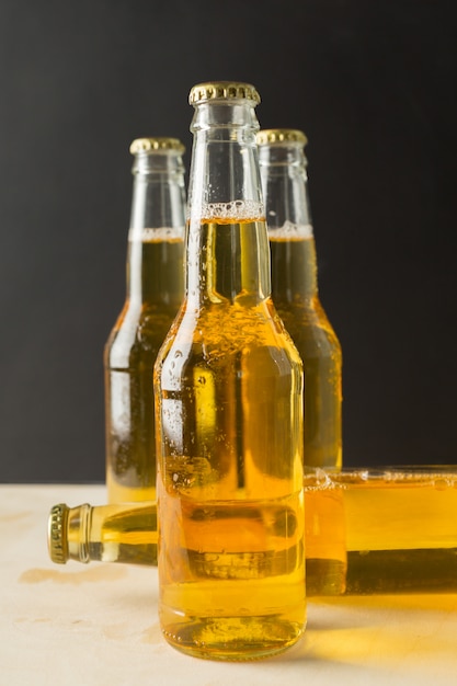 Beer bottles on a wooden table ,