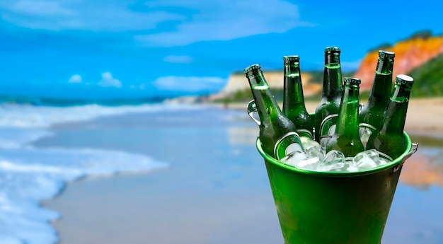 Photo beer bucket with ice on the beach
