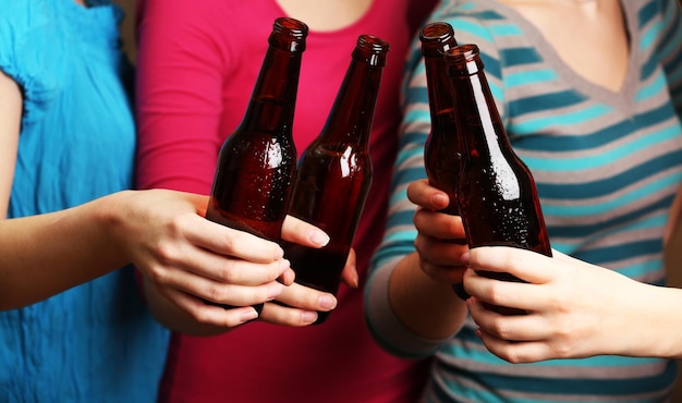 Beer in female hands closeup