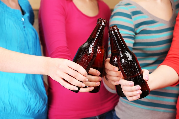 Beer in female hands, closeup