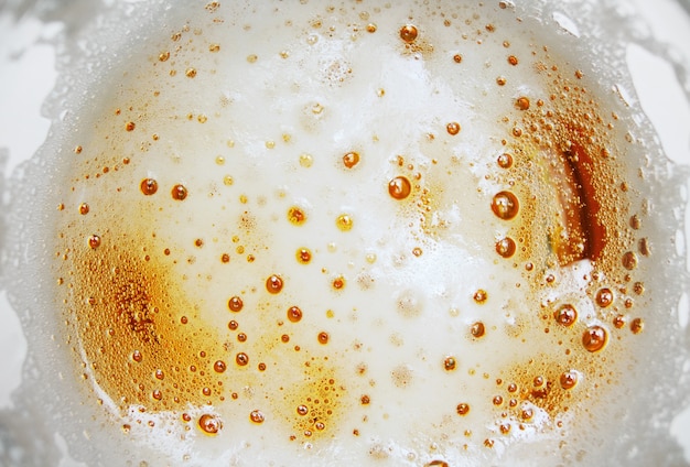 Beer foam with bubbles