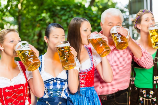 Beer garden - friends drinking in Bavaria Pub