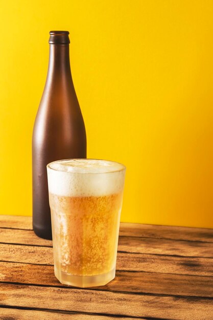 Beer glass bottle beer on a wooden background selective focus