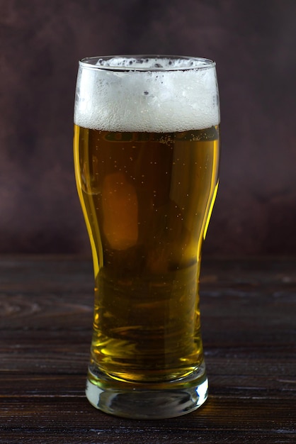 beer in a glass on a dark background