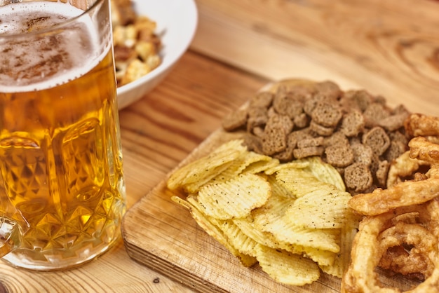 Beer glass and snacks