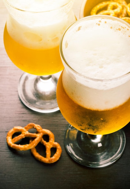 Beer in the glass a stemmed glass closeup Cool drink in the pub