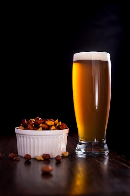 Beer glass with peanuts