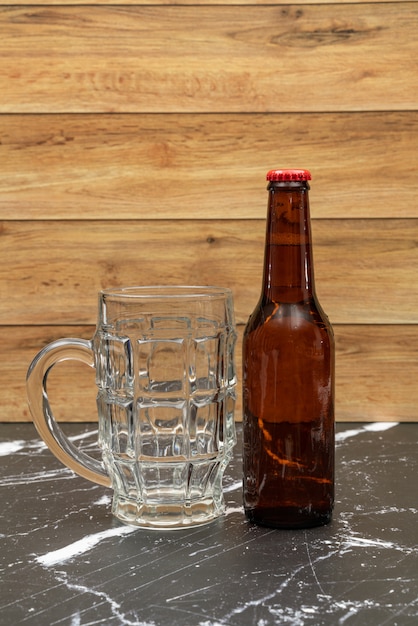 Beer gold bottle with glass for beer