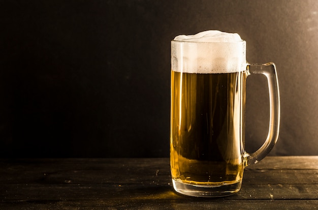 Beer mug on a wooden table.