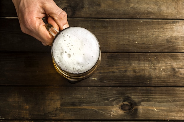 Beer mug on a wooden table.