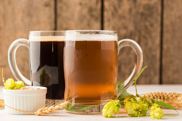 Photo beer mugs and wheat seeds arrangement