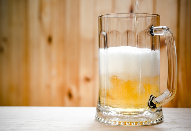 Beer pouring into mug