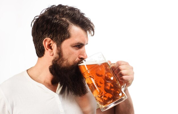 Beer pub or bar stylish handsome man drinking beer of mug oktoberfest celebration bearded man with