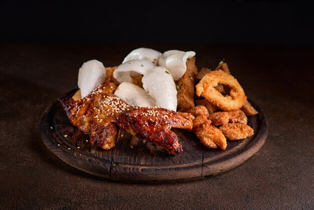 Beer Set. Prawn chip , fried squid rings, garlic bread, cheese sticks for company, photo in the menu.