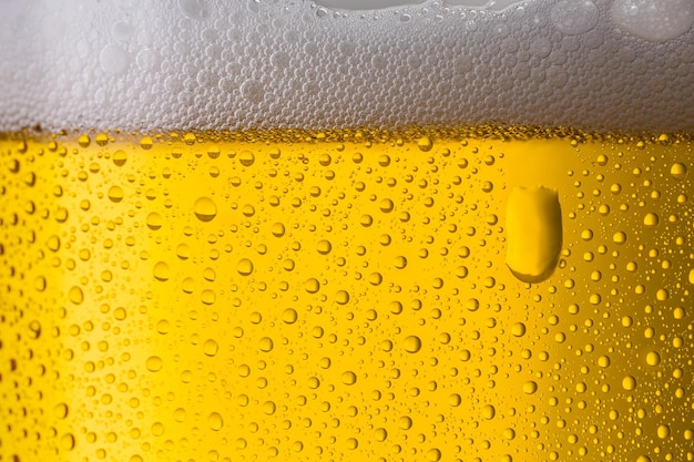 A beer with dew drops background. ideal for websites and magazines layouts