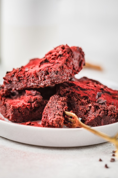 Beet brownie on gray plate. Healthy vegan food.