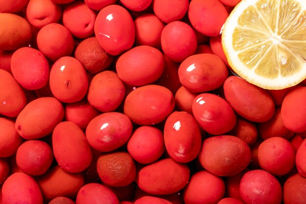 Photo beet flavored olives closeup pile of red kalamata olives