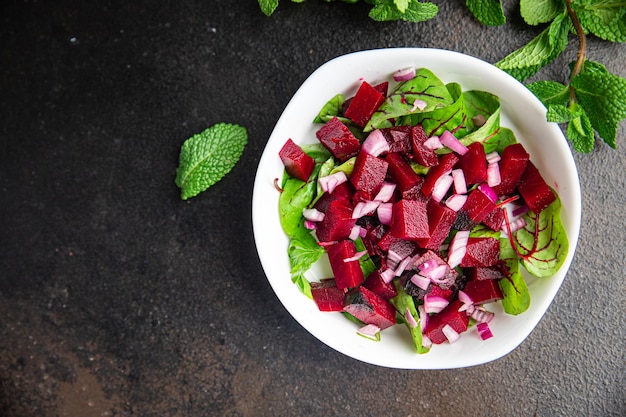 Beet salad beetroot onion lettuce ready to eat fresh portion\
dietary healthy meal food diet